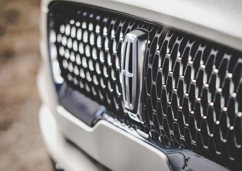 The grille of the 2024 Lincoln Aviator® Reserve model with an eye-catching repeated field of Lincoln Star logo shapes | Stivers Lincoln in Waukee IA