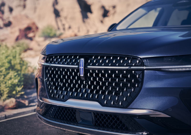 The stylish grille of a 2024 Lincoln Nautilus® SUV sparkles in the sunlight. | Stivers Lincoln in Waukee IA