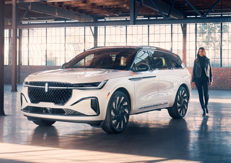 A person approaches a 2024 Lincoln Nautilus® SUV. | Stivers Lincoln in Waukee IA