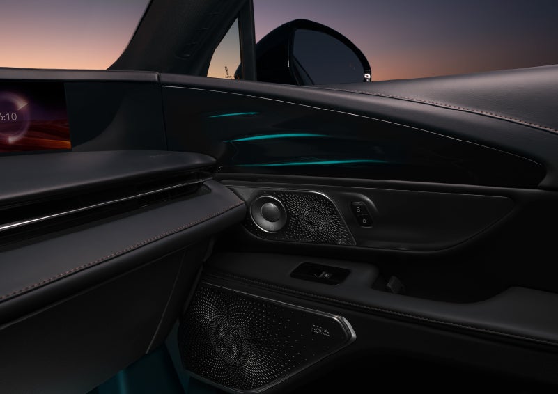 Selectable ambient lighting glows in the passenger door panel. | Stivers Lincoln in Waukee IA