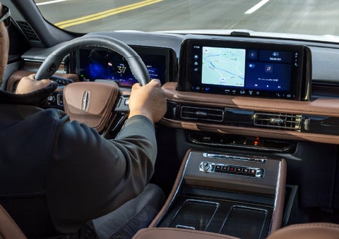 A person is driving a 2026 Lincoln Aviator® SUV as seen from inside the cabin. | Stivers Lincoln in Waukee IA