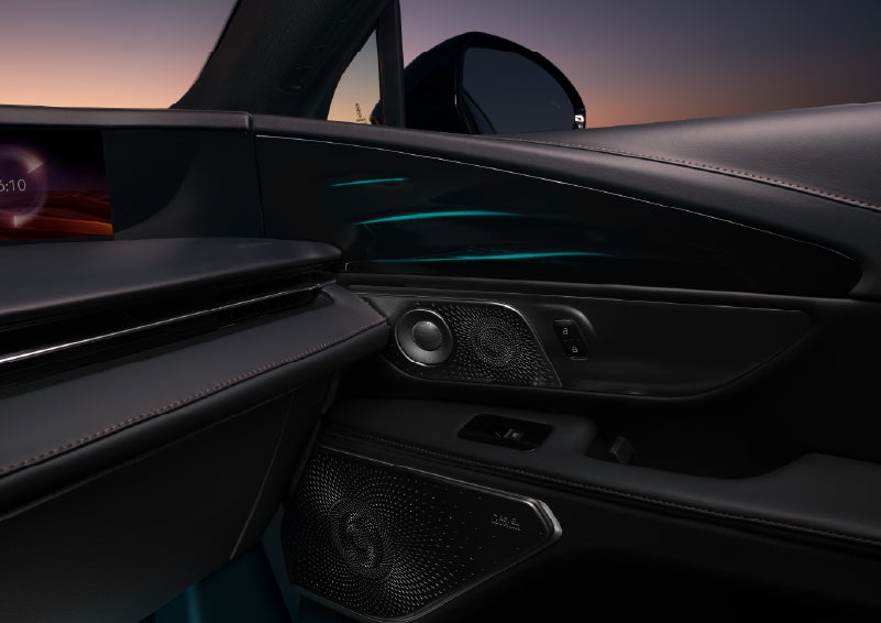 Selectable ambient lighting glows in the passenger door panel. | Stivers Lincoln in Waukee IA