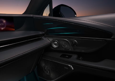 Selectable ambient lighting glows in the passenger door panel. | Stivers Lincoln in Waukee IA