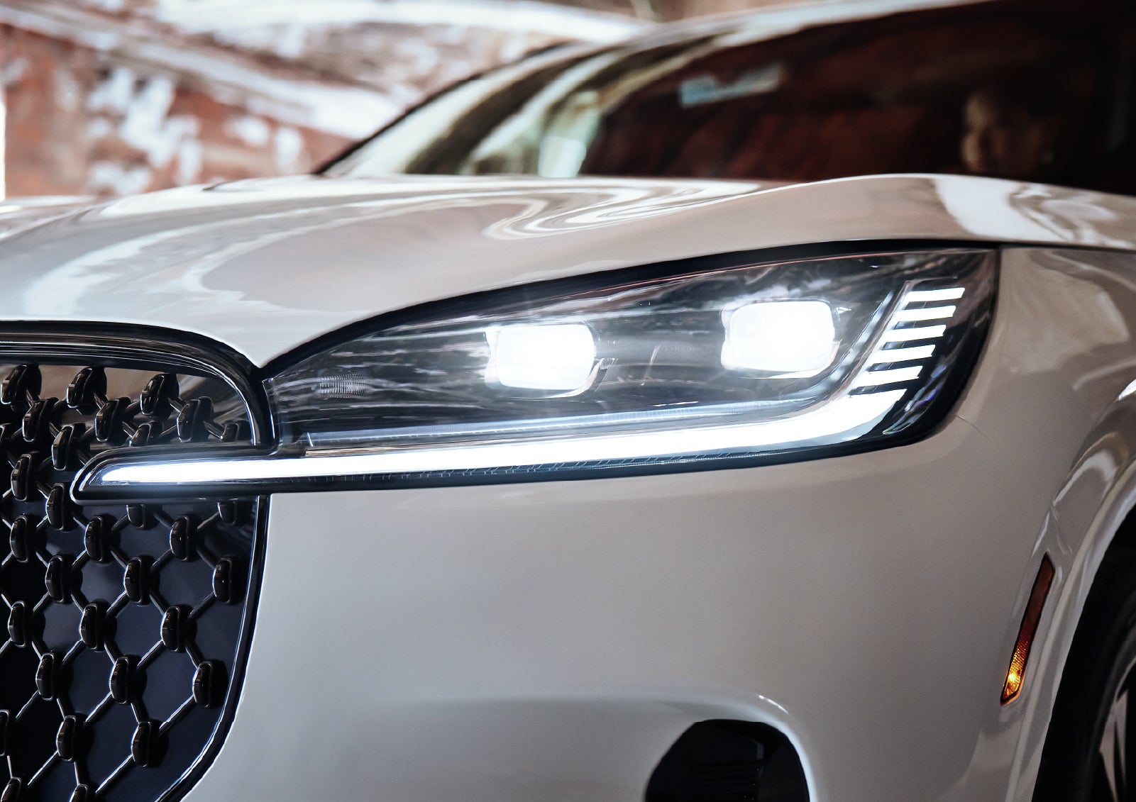 A close-up of a headlamp on the 2027 Lincoln Aviator® SUV is shown. | Stivers Lincoln in Waukee IA