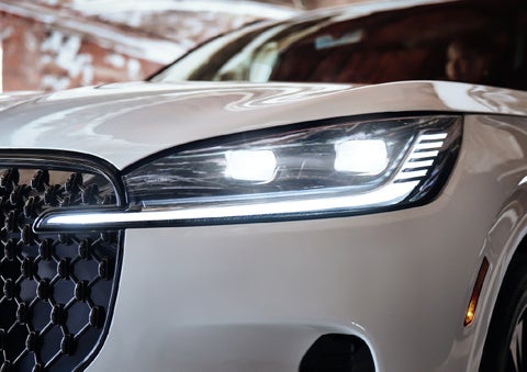 A close-up of a headlamp on the 2027 Lincoln Aviator® SUV is shown. | Stivers Lincoln in Waukee IA